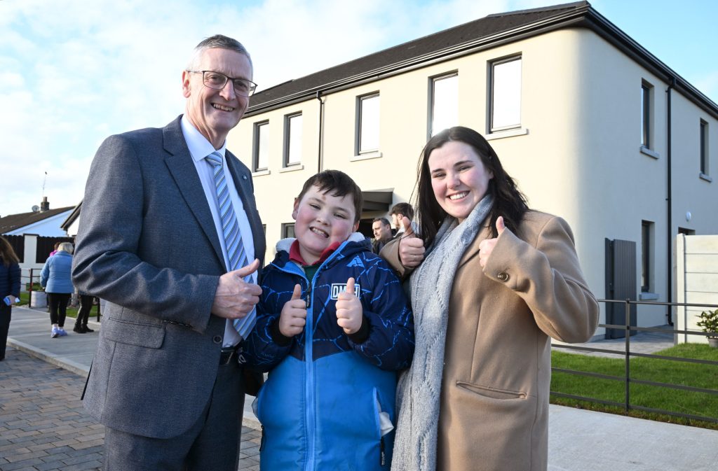 Martin O’Brien, the chief executive of LMETB with one of the families moving into the first ever 3D concrete printed homes built in Ireland and the UK, at Grange Close in Dundalk.